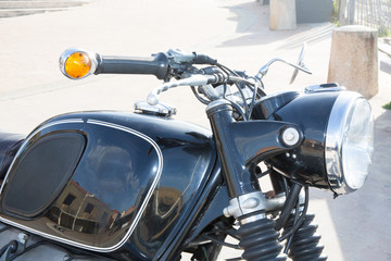 top vintage detail motorbike in street