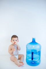 Baby with a water bottle