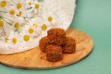 Delicious sweets with topping of saffron