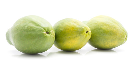 Three green papaya (pawpaw, papaw) in row isolated on white background.