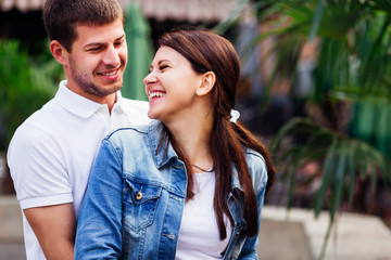 couple in love sincerely laughs to each other and spend their time well