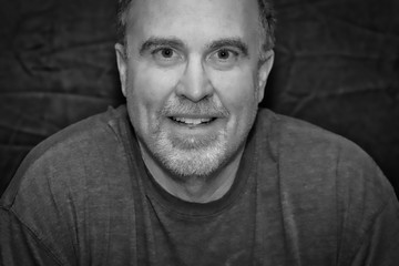 Fototapeta premium Smiling mature man in casual black and white portrait