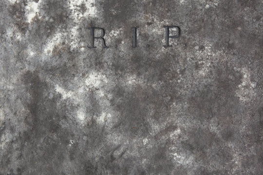 RIP. Rest in peace. Traditional inscription on the grave.