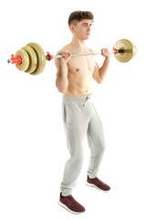 Obraz premium 18 Year old teenage boy lifting weights