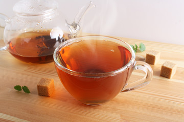 tea cup teapot wooden background