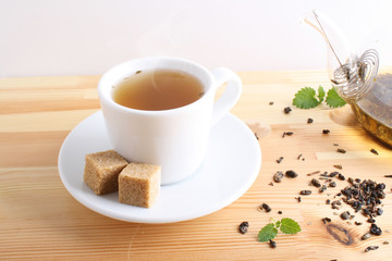 tea cup teapot wooden background