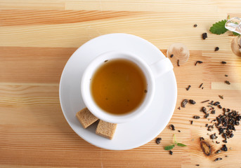 tea cup teapot wooden background
