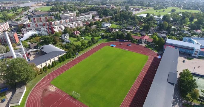 Aerial shoot of the modern football field with facilities.