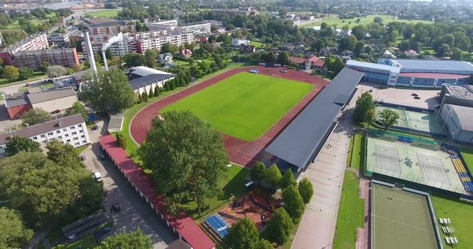 4k Aerial shoot of the Ventspils football field.