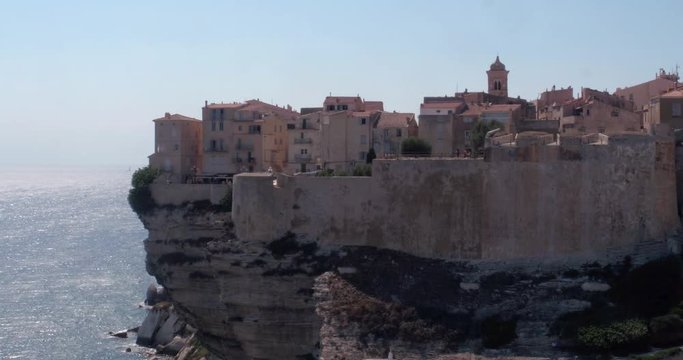 Video shot of Bonifacio cityscape on a sunny day with cliffs and sea in view