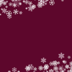 Christmas snow background with scattered snowflakes falling in winter
