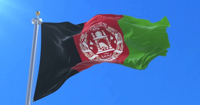 Afghanistan flag waving at wind in slow with blue sky, loop