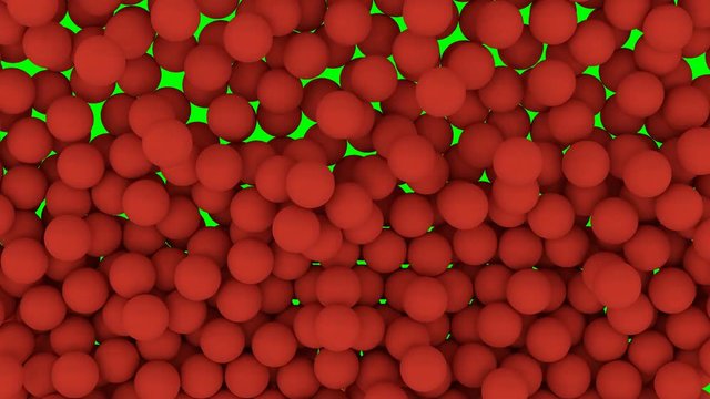 Animated falling and bouncing a lot of red plain Ping-pong balls filling container against green background. Front camera shot.