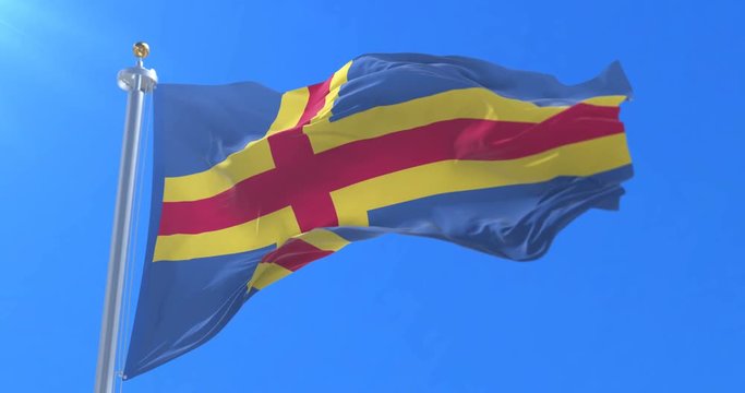 Aland Islands Flag waving at wind in slow with blue sky, loop