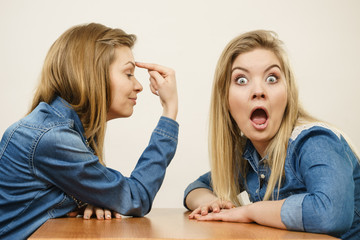 Two women having argue fight