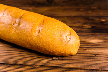 French white baguette on a wooden table
