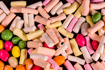 Background of the different multi colored candies. Festive concept