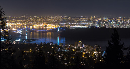 Naklejka premium Night view of Lions Gate Bridge, Vancouver downtown, and Lower Mainland