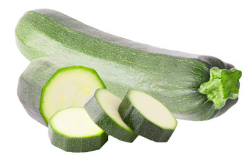 Two zucchini and slices isolated on white