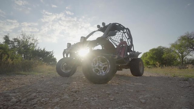 Dune Buggy standing in the sunset on a dirt road in Croatia