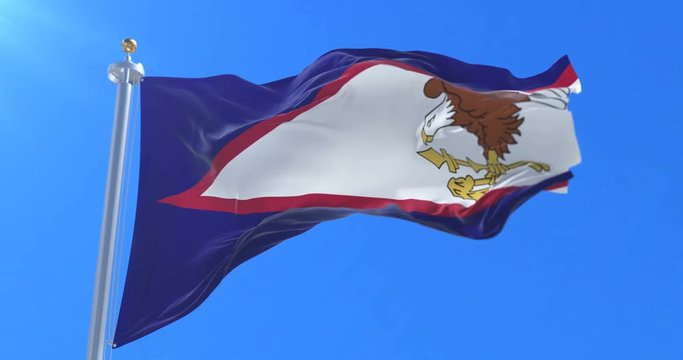 American Samoa flag waving at wind in slow with blue sky, loop
