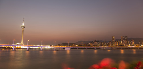 Governador Nobre de Carvalho Bridge and Macau Tower at sunset time