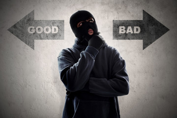 Masked thief thinking