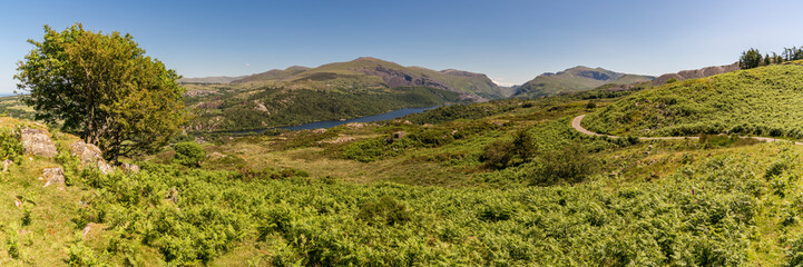 Fototapeta na wymiar Snowdonia landscape near Rhiwlas, Gwynedd, Wales, UK - with Llyn Padarn and Mount Snowdon in the background