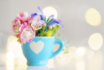cup with flowers