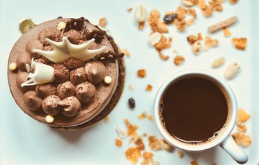 chocolate cake on the white plate with a cup of coffee, food macro photography decoration concept for new year party.