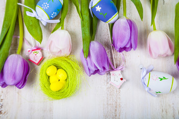 Bouquet purple tulips and Easter eggs