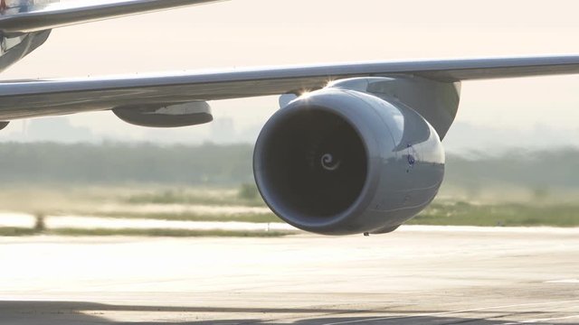 Aircraft turbine engine at work. Close-up