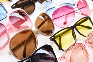 Modern fashionable sunglasses isolated on white background