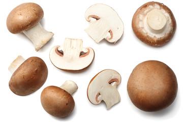 Fresh champignon mushrooms isolated on white background. top view
