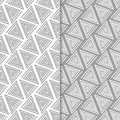 Gray and white geometric ornaments. Set of seamless patterns