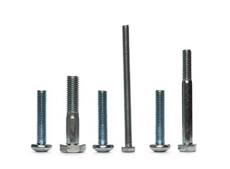 Pile metal screws, bolts and nuts isolated on white background
