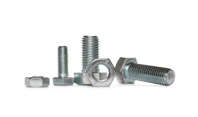 Pile metal screws, bolts and nuts isolated on white background