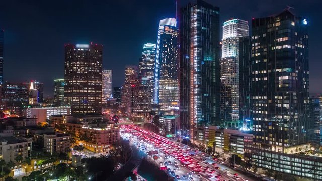 Cinematic urban aerial time lapse of downtown Los Angeles at night.