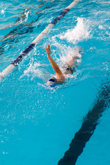 boy on a swim in a sports pool