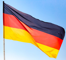 Flag of Germany against the blue sky