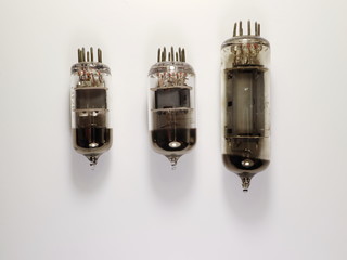 old radio tubes on a white background