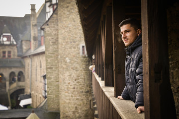 Man sitting in a balcony