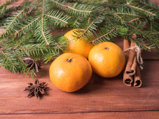 Fototapeta na wymiar Christmas card, pine branches, spruce,wreath and tangerines