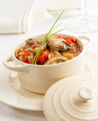 Lamb stew with onions and bell pepper.