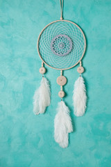 Dream catcher on aquamarine