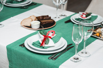 Served New Year or Christmas table closeup. Luxury restaurant