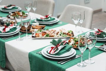 Served New Year or Christmas table closeup. Luxury restaurant