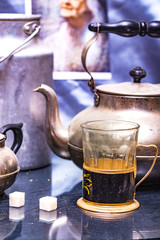 retro teapot and retro glass