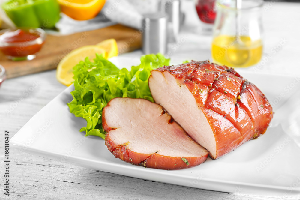 Wall mural plate with traditional honey baked ham on table