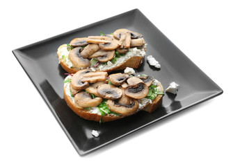 Plate with tasty toast, cheese and mushrooms, isolated on white